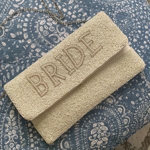 Bride clutch with silver shoulder strap